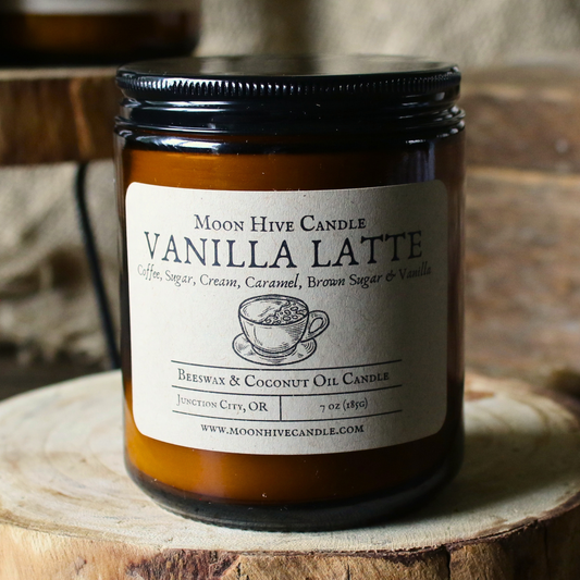 Moon Hive Candle Vanilla Latte on a wooden surface